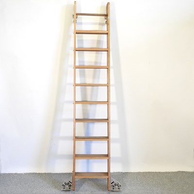 Lot 405 - A modern oak library ladder