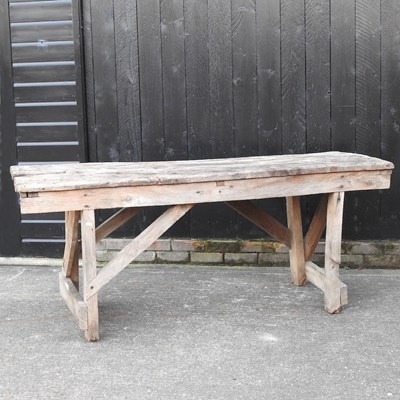 Lot 343 - An elm workbench