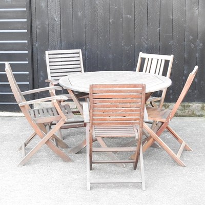 Lot 336 - A hardwood garden table