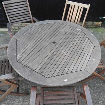 Lot 336 - A hardwood garden table