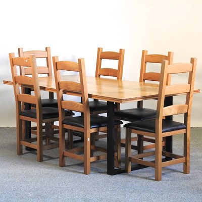Lot 403 - A light oak dining table
