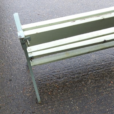 Lot 17 - A cast iron and slatted wooden garden bench
