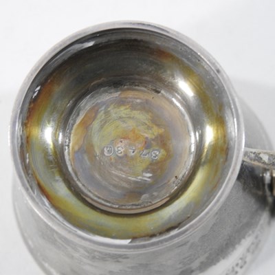 Lot 63 - An early 20th century silver christening cup