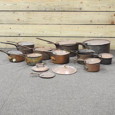 Lot 243 - A collection of antique copper pans