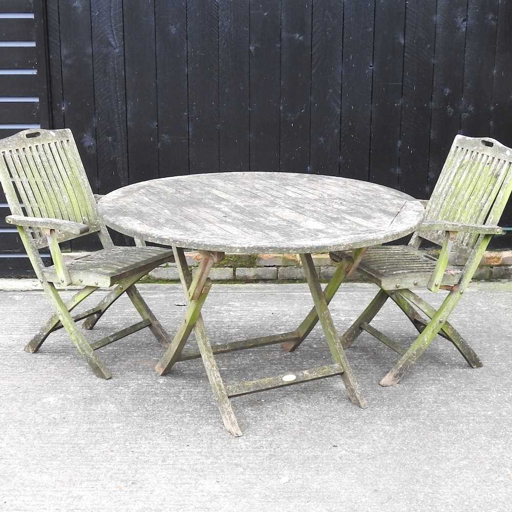 Lot 307 - A hardwood garden table