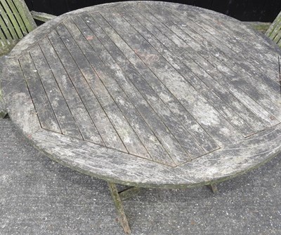 Lot 307 - A hardwood garden table