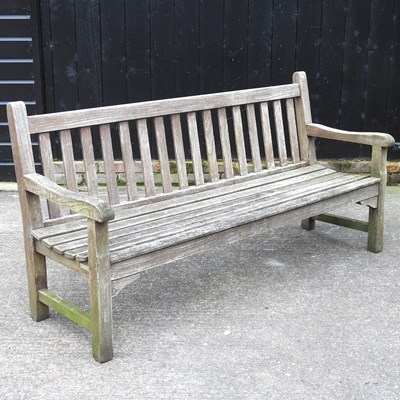 Lot 303 - A hardwood slatted garden bench