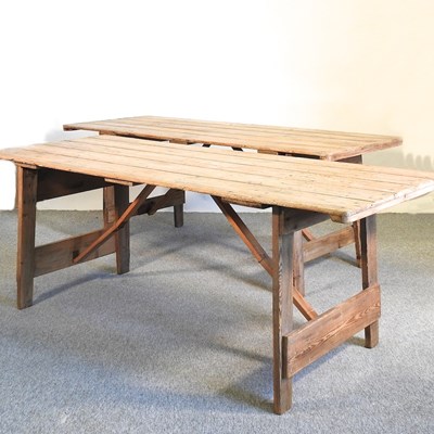 Lot 358 - A folding wooden trestle table