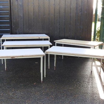 Lot 327 - A set of five metal tables