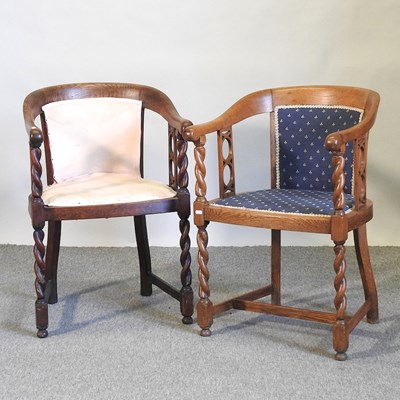 Lot 440 - A 1920's oak tub shaped chair