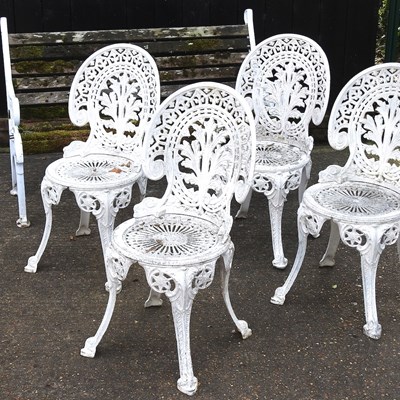 Lot 310 - A set of four white painted metal chairs