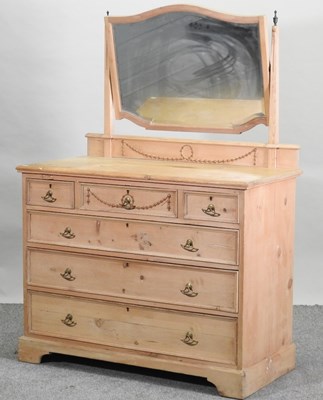 Lot 69 - An Edwardian stripped pine dressing chest