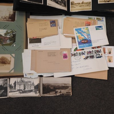 Lot 199 - A collection of stamps and postcards