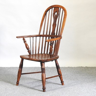 Lot 603 - A windsor style armchair