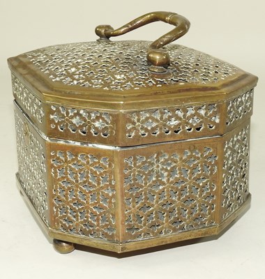 Lot 94 - A Persian pierced brass casket