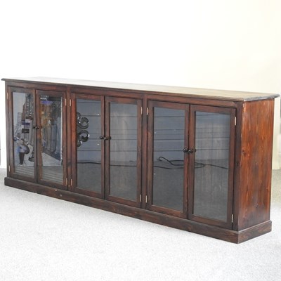 Lot 433 - A large stained pine bookcase