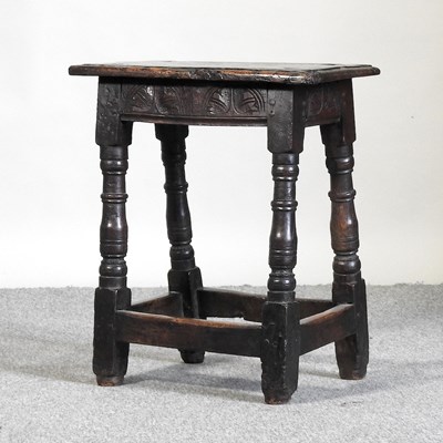 Lot 539 - An oak joint stool