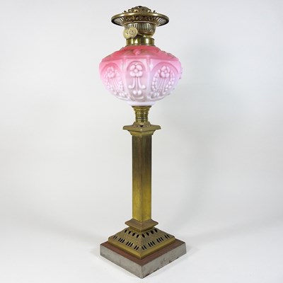 Lot 227 - A brass column oil lamp