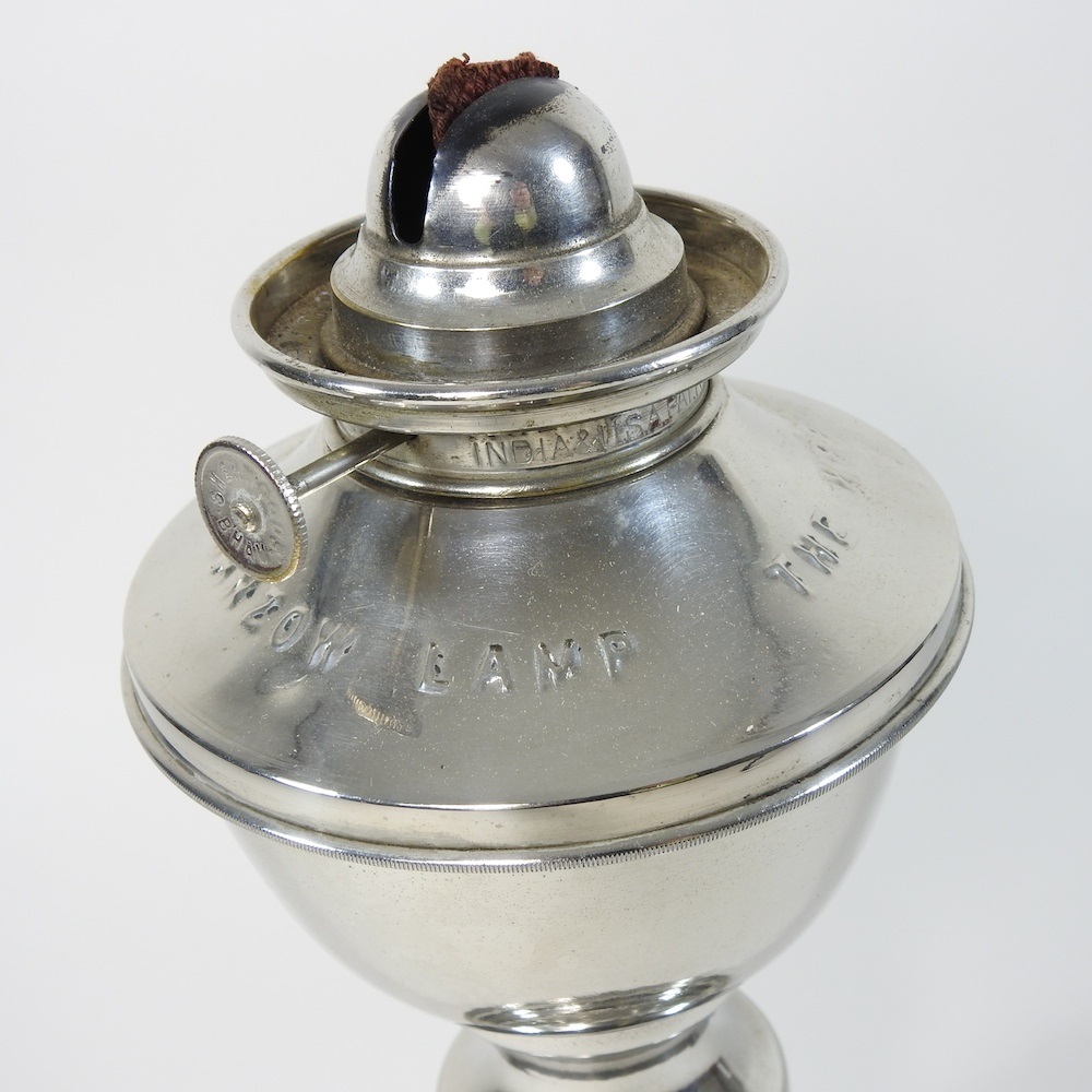 Lot 175 A clockwork oil lamp