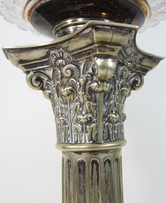 Lot 56 - A silver plated oil lamp