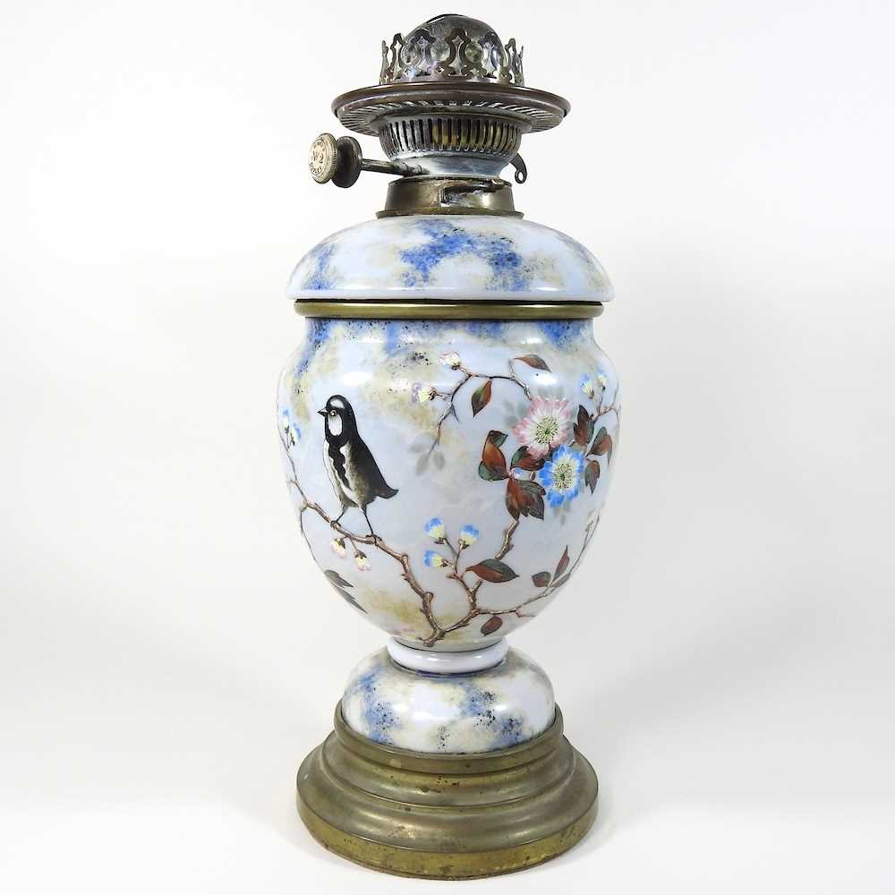 Lot 135 - An opaque glass oil lamp