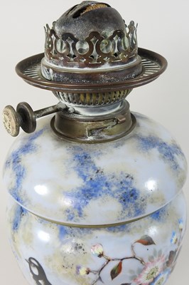 Lot 135 - An opaque glass oil lamp