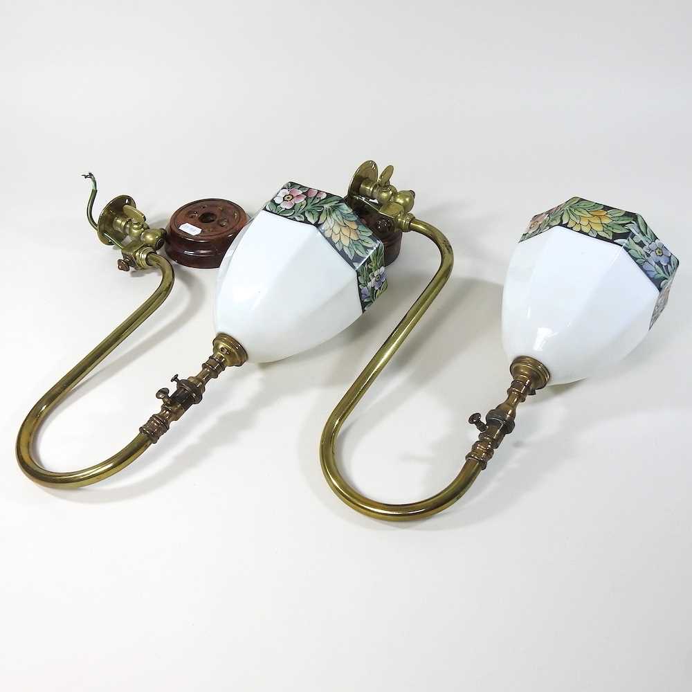 Lot 216 - A pair of brass wall lights