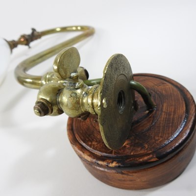 Lot 216 - A pair of brass wall lights