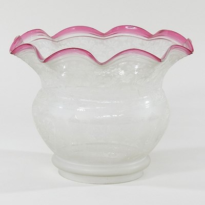 Lot 303 - A glass oil lamp shade