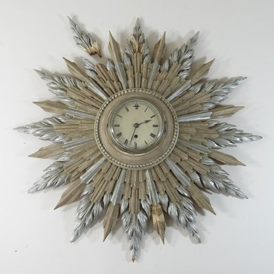 Lot 208 - An early 20th century sunburst wall clock