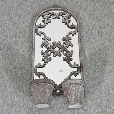 Lot 369 - A metal framed garden mirror