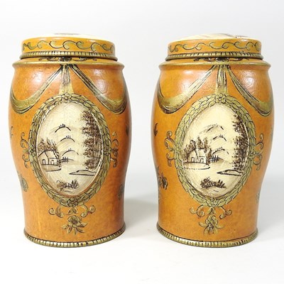Lot 88 - A pair of tole style canisters