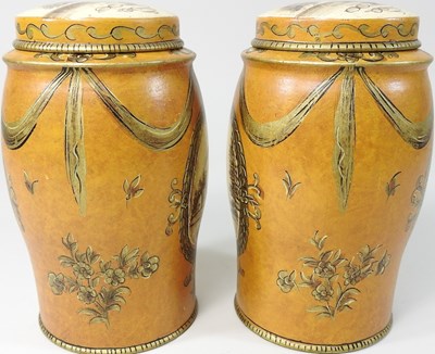 Lot 88 - A pair of tole style canisters