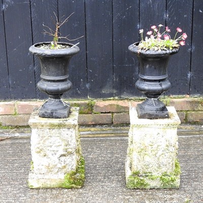 Lot 355 - A pair of small cast iron garden planters