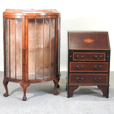 Lot 623 - A 1920's walnut display cabinet