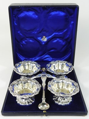 Lot 12 - An early 20th century silver four piece condiment set