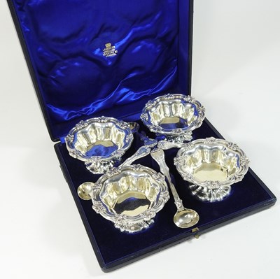 Lot 12 - An early 20th century silver four piece condiment set