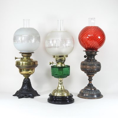 Lot 252 - Three oil lamps