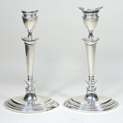 Lot 58 - A pair of Edwardian silver candlesticks