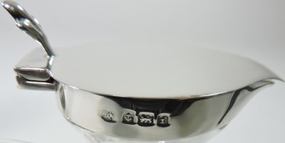 Lot 170 - A Edwardian silver mounted whisky tot
