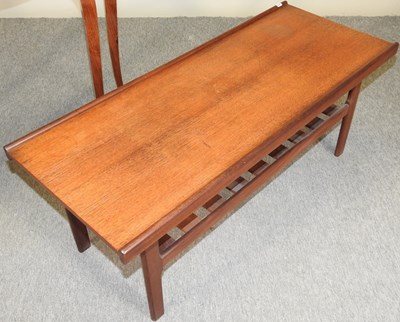 Lot 694 - A mid 20th century teak coffee table