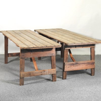 Lot 418 - A folding pine trestle table