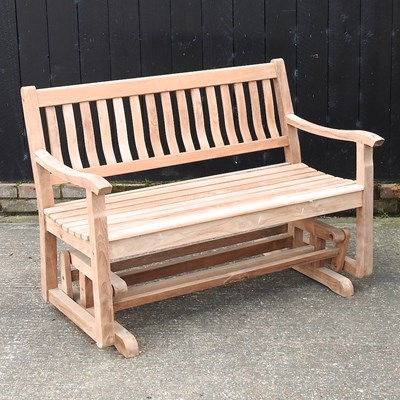 Lot 352 - A teak garden bench