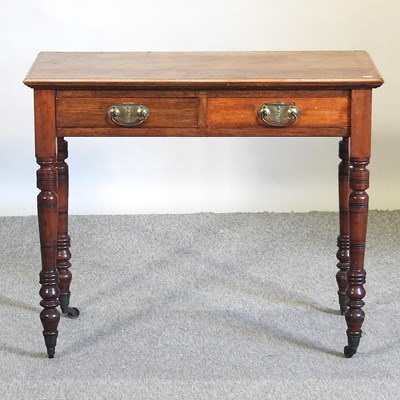 Lot 524 - An Edwardian walnut side table