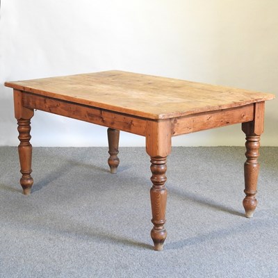 Lot 411 - A rustic pine dining table