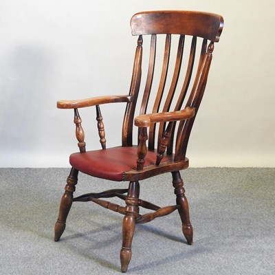 Lot 484 - A 20th century splat back armchair