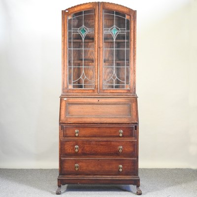 Lot 568 - A 1920's bureau bookcase