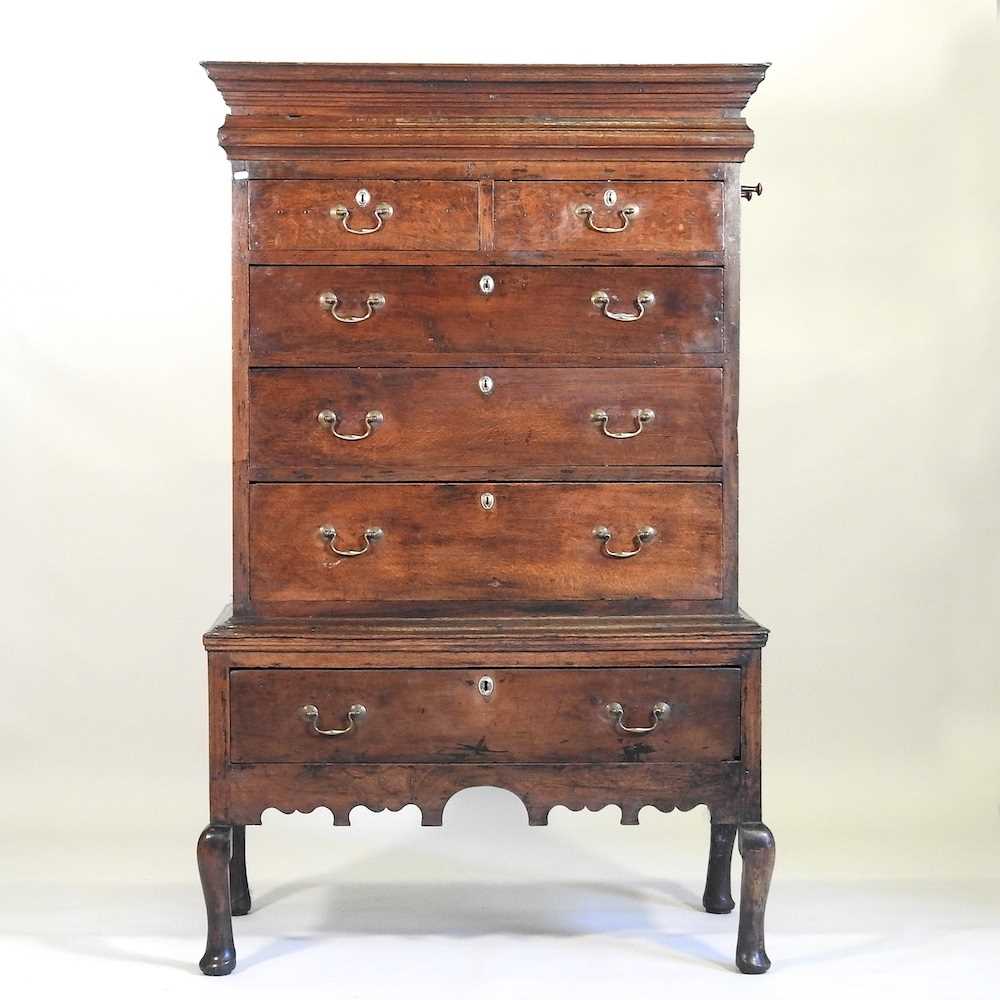 Lot 95 - A Queen Anne chest on stand