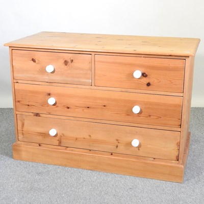 Lot 406 - An antique pine chest of drawers