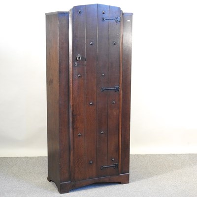 Lot 771 - A 1920's oak hall cupboard